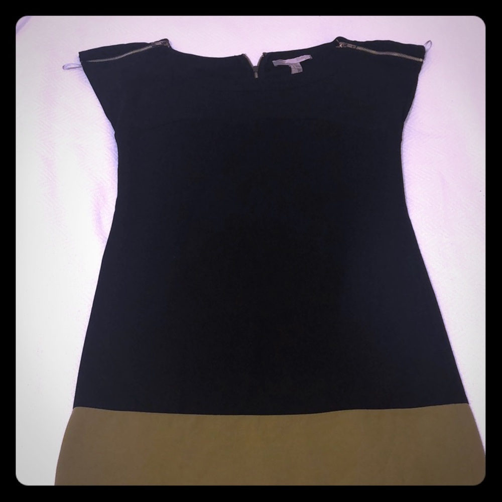 Black sleeveless dress.